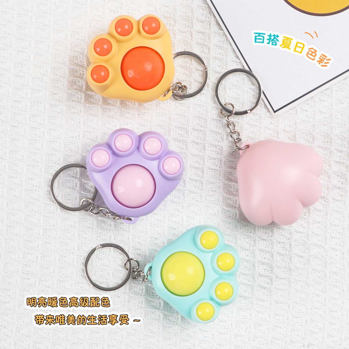 12pc- Cat Paw keychain net price 38