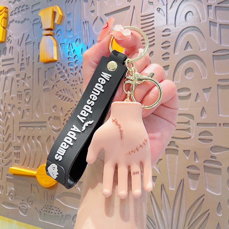 Wednesday hand rubber keychain pack of 3 (eff price 40)