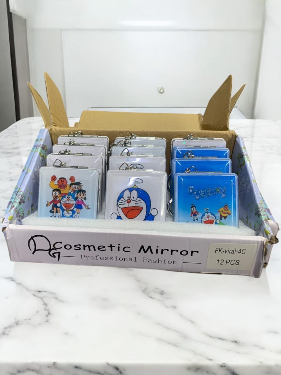 Doremon Glitter Mirror Pack of 12 ( eff price 76 )