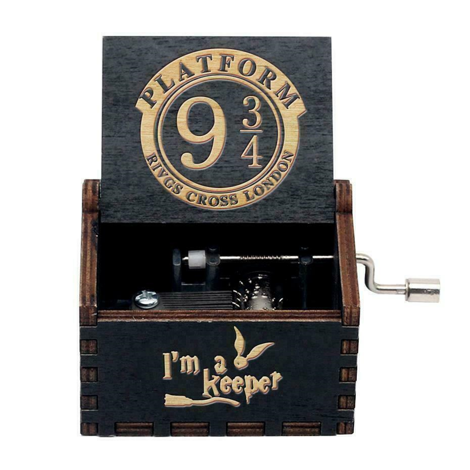 black 93/4 hp magic boy music box