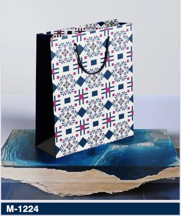 Assorted printed gift bags in bulk packs for retail stock