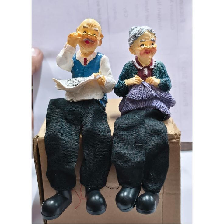 2 Pairs - Dada Newspaper , dadi sweater approx 15cm . Net pair cost 130