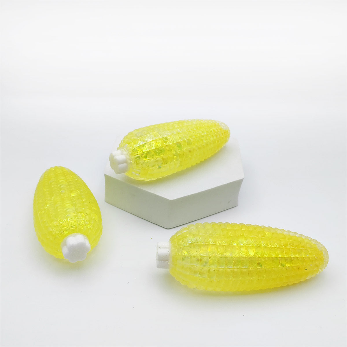 Pack of 12 corn shape glitter squezee toy ( eff price - 60 )