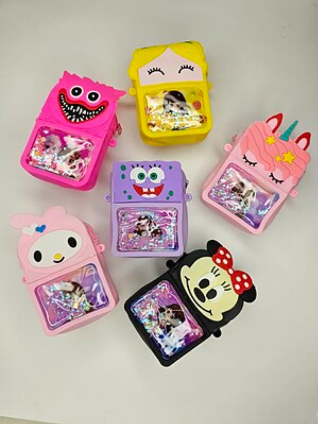 Mix silicon glitter popit pouch pack of 12  ( net price -55 )