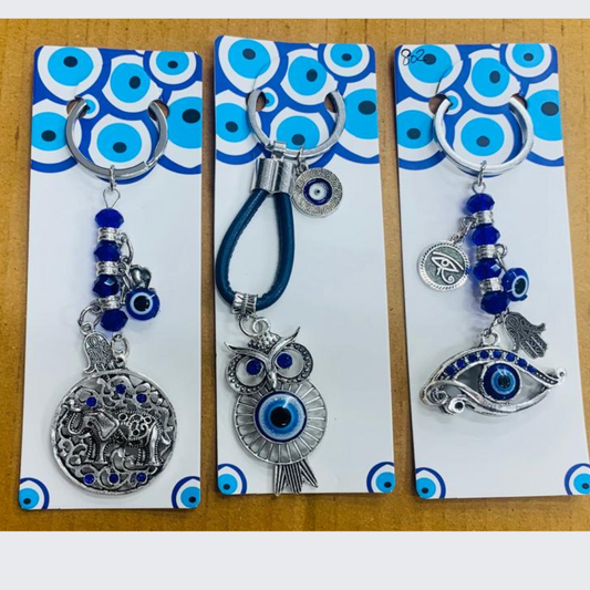 12pcs -mix 3 design evil eye keychain ( eff price 42 )