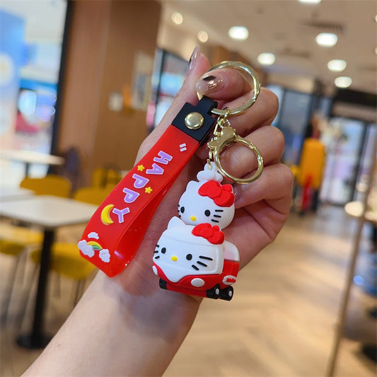 Hello kitty on scooter  Rubber keychain