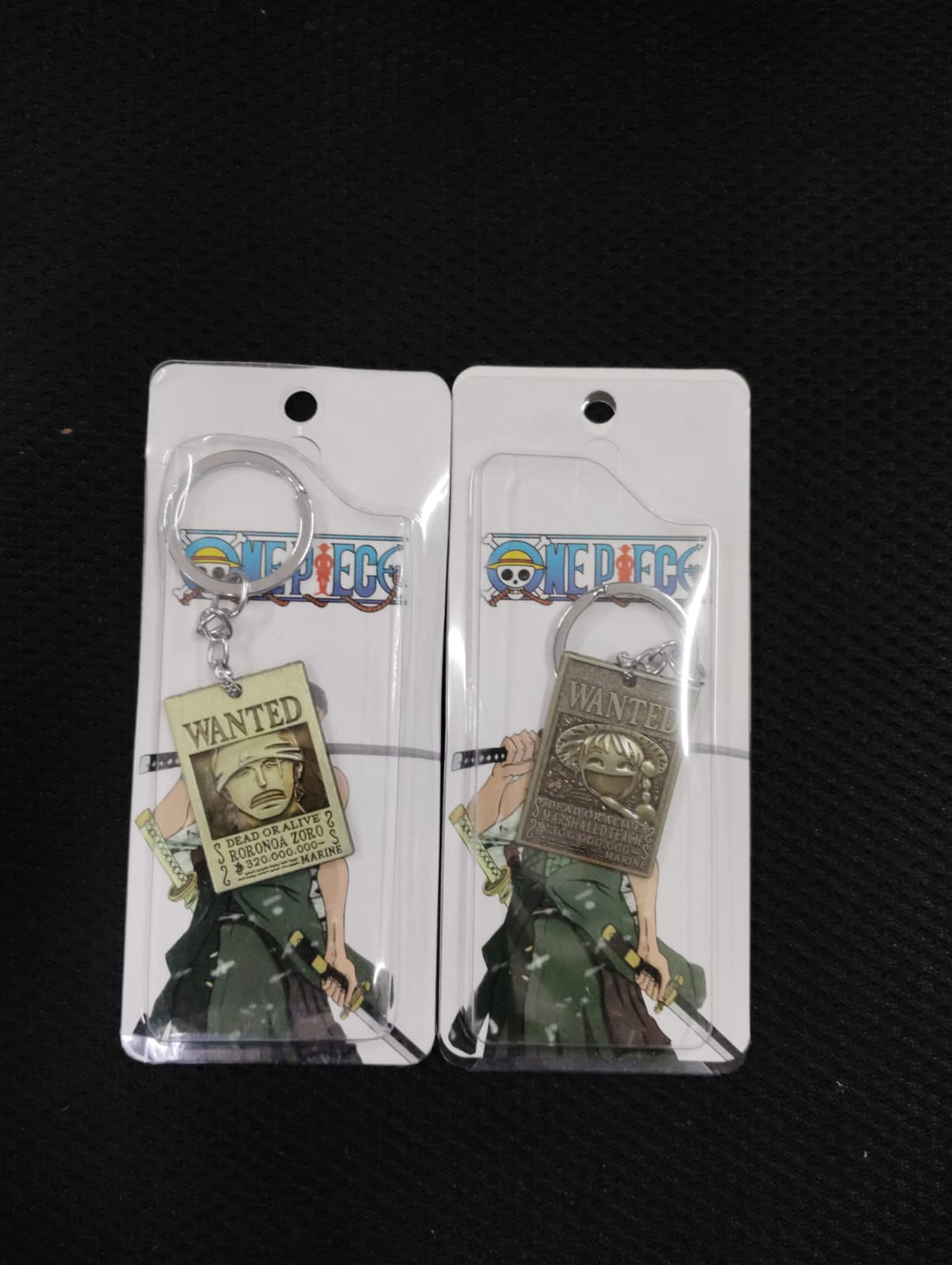 pack of 6 wanted metal keychains  ( eff price 40 )