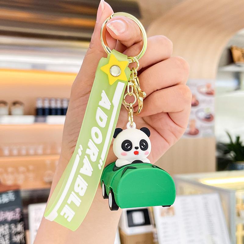 panda in car rubber keychain