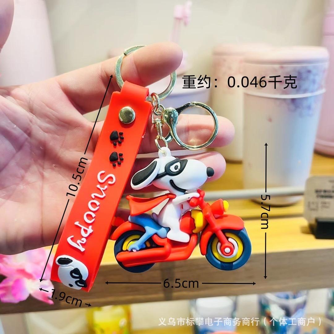 snoopy on bike rubber keychain pack of 3 ( eff price 48 )