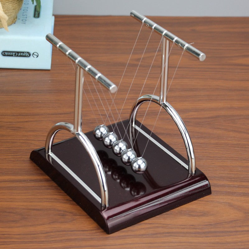 Newtons cradle - T