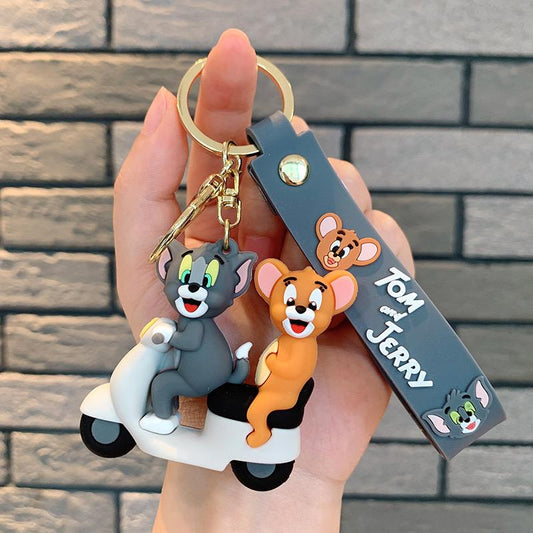 Tum & jurry on scooter rubber keychain