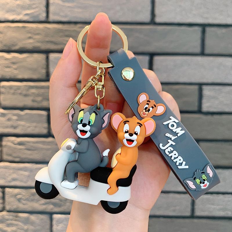 Tum & jurry on scooter rubber keychain